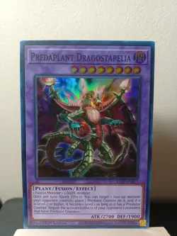 YuGiOh! - Predaplant Dragostapelia - 1st Edition Super Rare RA01-EN027 NM - Image 1