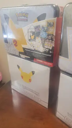 2 Pokemon 25th anniversary Celebrations ETB And 2 Lunchbox Tins - Image 3