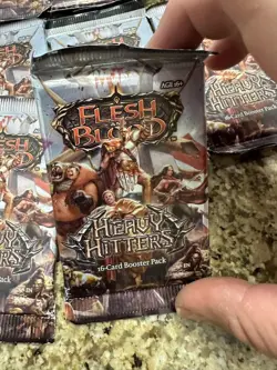 Flesh and Blood CCG: Heavy Hitters Booster Box (14 Packs) - Image 1