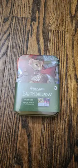 Magic The Gathering Bloomburrow Tin (2 Promo Cards,5 Play Booster Packs - Image 1