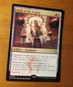 MTG 1x Aegis of the Legion, NM, Ravnica: Clue Edition, Equipment Shield Counters - Image 1