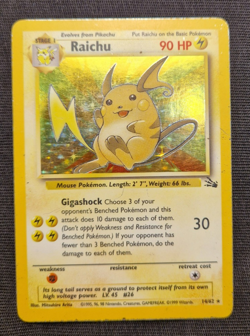 Raichu Holo 14/62 Fossil 1999 WOTC Vintage Pokemon Card Moderately Played - Image 1