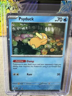 Psyduck Cosmos Holo Promo Pokemon Card MEP 007 - Image 1