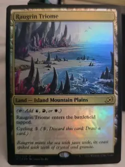 Raugrin Triome Ikoria: Lair of Behemoths Foil - Image 1