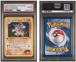 PSA 8 2000 POKEMON TCG GYM HEROES #2 BROCK'S RHYDON HOLO-1ST EDITION - Image 1