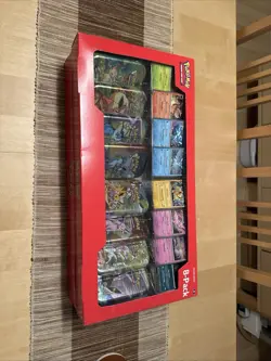 Pokemon Prismatic Evolutions 8 Mini-Tins w Promo Cards Costco - Image 1
