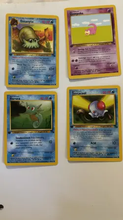 First Edition Pokemon Fossil Cards Set Of Four - Image 1
