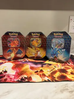 Pokemon Hidden Fates Tins (Set of 3 Tins) - Charizard, Raichu, Gyarados Art Set - Image 1