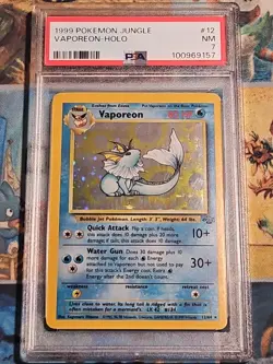 1999 POKEMON JUNGLE #12 VAPOREON-HOLO PSA 7 NM - Image 1