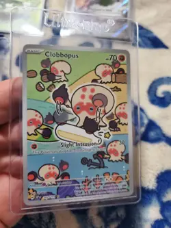 Near Mint Clobbopus 207/191 Surging Sparks Illustration Rare Holo Pokemon - Image 1
