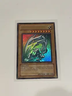 Blue-Eyes White Dragon SDK-001 1st Edition N.A. - LP - Holo Bleed 🩸 - Image 1
