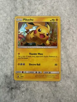 Pokemon TCG Pikachu SM76 Cosmos Holo Sun & Moon Black Star Promo - Image 1