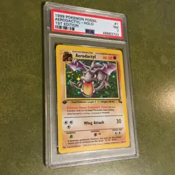 Pokemon Fossil 1999 1st Edition Aerodactyl HOLO 1/62 PSA 7-Authentic/Graded - Image 1