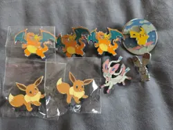 Pokemon Pins (8) | Celebrations UPC Charizard & Pikachu, Eevee, Sylveon, Pikachu - Image 1