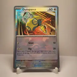 Pokemon Prismatic Evolutions Dunsparce 079/131 Poke Ball Pattern Holo NM - Image 1