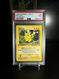 1999 POKEMON JUNGLE #60 PIKACHU 1ST EDITION VINTAGE PSA 9 - Image 1