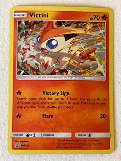 POKEMON VICTINI SM225 BLACK STAR PROMO COSMOS HOLOFOIL NM CARD - Image 1