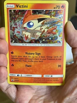 POKEMON VICTINI SM225 BLACK STAR PROMO COSMOS HOLOFOIL NM CARD - Image 2