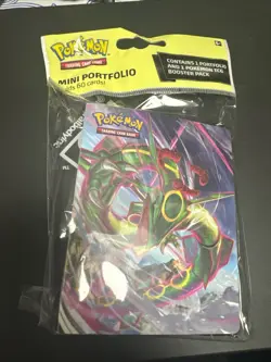 Evolving Skies Pokemon TCG Mini Portfolio with 1 Sealed Booster Pack - Image 1