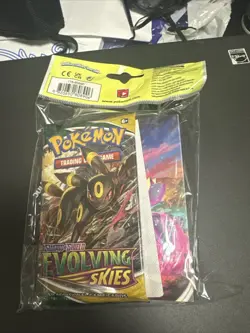 Evolving Skies Pokemon TCG Mini Portfolio with 1 Sealed Booster Pack - Image 2