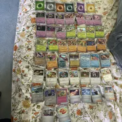 Pokemon Prismatic Evolutions Holo Rev Holo Lot 50 Different Cards - Image 1