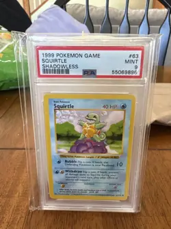 1999 Pokemon TCG Base Set Squirtle 63/102 Shadowless PSA 9 - Image 1