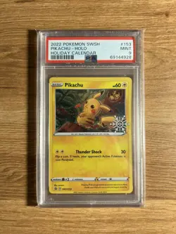 Pokemon - Pikachu SWSH153 Holiday Calendar 2022 Black Star Promo - PSA 9 Mint - Image 1