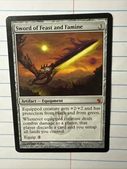 Mirrodin Besieged Sword of Feast and Famine Regular Card - Image 1