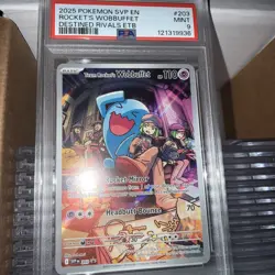 Pokemon TCG Destined Rivals Team Rockets Wobbuffet Promo Card 203 PSA 9 - Image 1