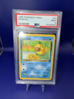 1999 Pokemon Fossil Psyduck #53 Mint PSA 9 - Image 1