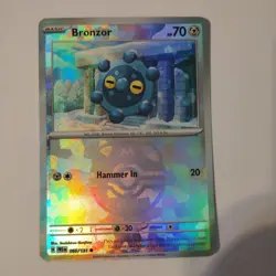 Pokemon TCG Bronzor (Master Ball Pattern) 066/131 Prismatic Evolutions Holo MINT - Image 1