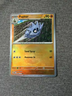 2025 Pokemon PRISMATIC EVOLUTIONS PUPITAR POKEBALL HOLO 48/131 PACK FRESH - Image 1