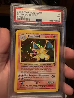 2000 Pokemon Charizard Holo Card Base Set II PSA Graded 7 NM 4/130 - Image 1