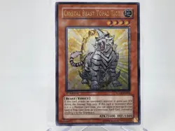 YuGiOh Crystal Beast Topaz Tiger FOTB-EN004 1st Edition Ultimate Rare NM - Image 1
