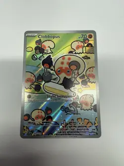 Clobbopus 207/191 Sv08: Surging Sparks Holo NM pokemon card Scarlet and Violet - Image 1