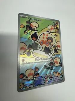 Clobbopus 207/191 Sv08: Surging Sparks Holo NM pokemon card Scarlet and Violet - Image 2