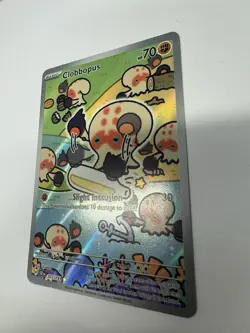 Clobbopus 207/191 Sv08: Surging Sparks Holo NM pokemon card Scarlet and Violet - Image 3