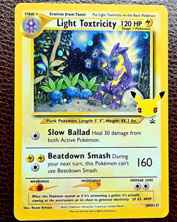 Pokemon TCG Light Toxtricity #SWSH137 Promo Celebrations - Image 1