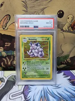 1999 POKEMON GAME #11 NIDOKING-HOLO PSA 8 - Image 1