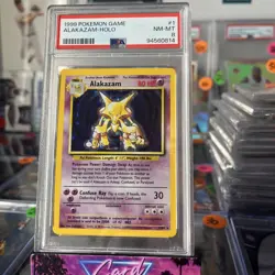 1999 POKEMON BASE SET UNLIMITED #1 ALAKAZAM-HOLO PSA 8 - Image 1