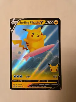 Pokemon TCG Surfing Pikachu v Holo Rare Card 008/025 Celebrations 2021 - Image 1