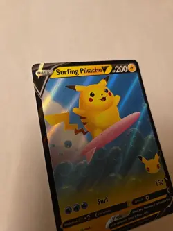 Pokemon TCG Surfing Pikachu v Holo Rare Card 008/025 Celebrations 2021 - Image 5