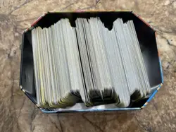 1.5lb Lot of 2000s-2010s Assorted Random Pokemon Cards in Collectible Tin - Image 1