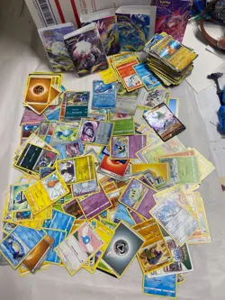 Pokemon Card Lot - 250 Cards Mixed Regular and Holos with portfolio binders - Image 1