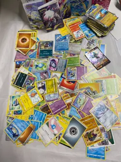 Pokemon Card Lot - 250 Cards Mixed Regular and Holos with portfolio binders - Image 2