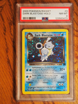 Pokemon 2000 Team Rocket Dark Blastoise rare holo card, PSA 8 - Image 1