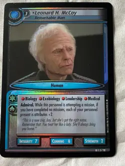 Star Trek CCG Promo Card LEONARD H. McCOY REMARKABLE MAN FOIL - Image 1