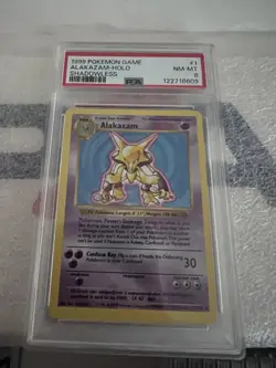 1999 Pokemon Alakazam Holo Shadowless Card 1/102 PSA 8 - Image 1