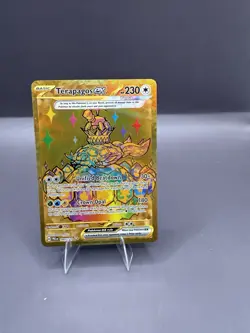 Pokemon TCG Terapagos EX Prismatic Evolutions Gold Hyper Rare Card 180/131 - Image 1