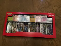 Pokemon TCG Prismatic Evolutions Mini Tin Display Case Sealed Tins, 8-Pack - Image 1